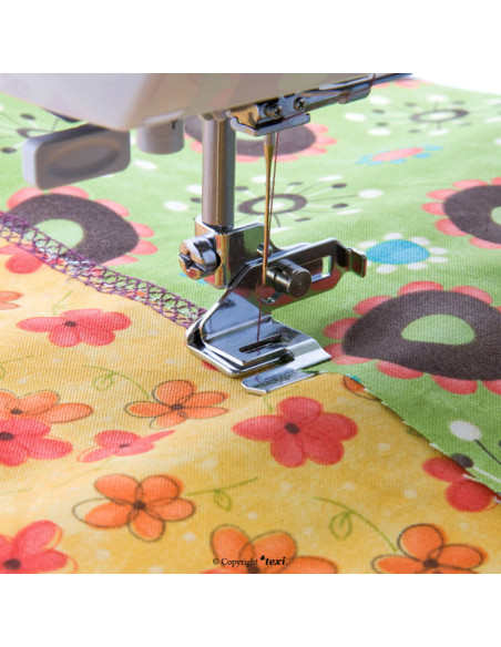 Outil pour couture bord à bord