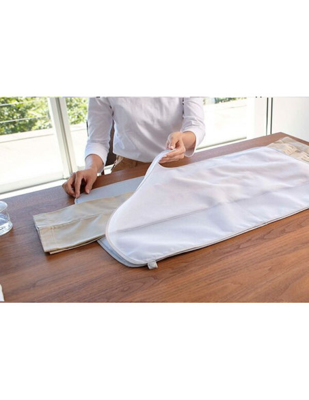 Tapis de repassage enroulable avec pattemouille amovible