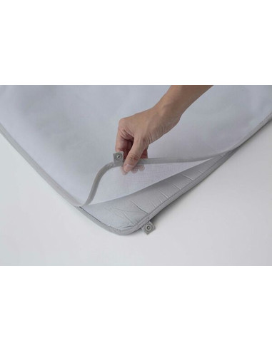 Tapis de repassage enroulable avec pattemouille amovible