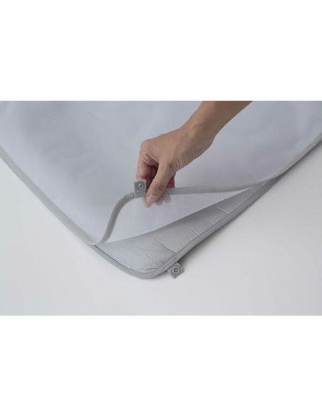 Tapis de repassage enroulable avec pattemouille amovible