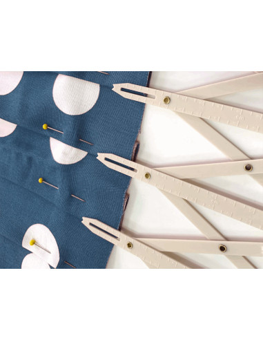 Règle de mesure pour boutonnières plastique