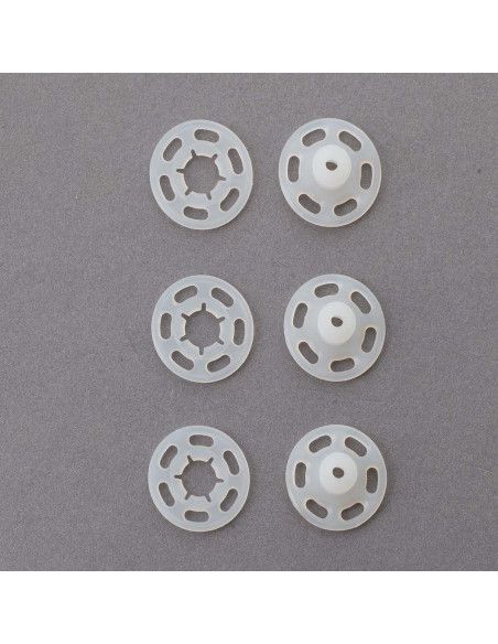 Boutons pression plastiques transparents 15 mm