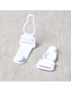 Set de 4 boucles porte jarretelle en plastique - Blanc