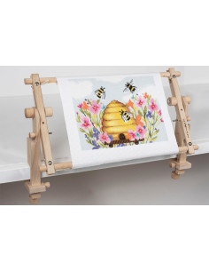 Cadre rotatif pour tapisserie avec couture