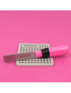 Ouvre boutonnière avec tapis de protection